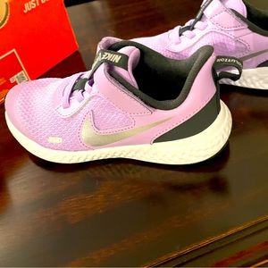 NWT Child’s size 11c Nike Revolution 5 brand new, never been worn, with box.